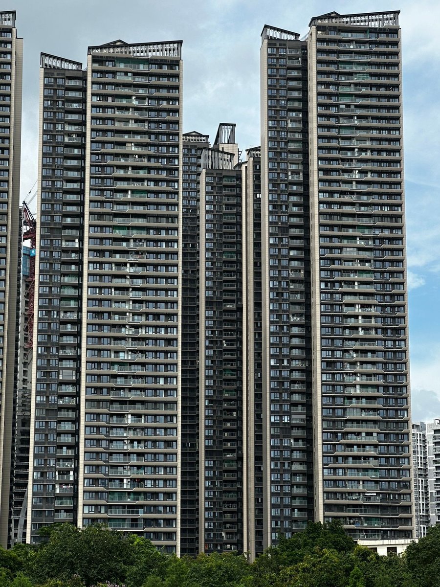 Tall modern high-rise apartment towers in daylight